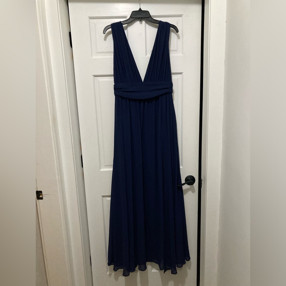 I am selling a prom/ bridesmaids dress this one is a size large